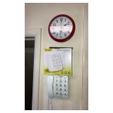 Big button phone, wall clock