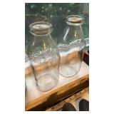 2 Mong Dairy Oil City Pa milk bottles w/paper