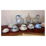 Crackle glass pitchers, tea cups saucers lot