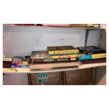 Shelf lot of old games cards