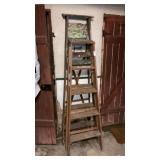 2 wooden stepladders