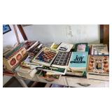 Cookbooks large lot on table