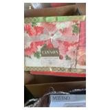 Assorted boxes of older towel sets in new