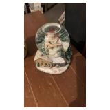 1 Christmas snow globe , 1 floral snow globe both