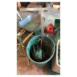 Plastic garbage can, drywall square, tarp and