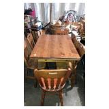 Maple dining table w/ pullout extensions & 6