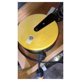 Retractable garage cord reel