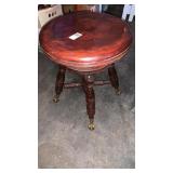 Piano stool with claw feet