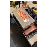 Basket of cigar boxes, signs and other