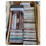 Box of music CDs and DVDs