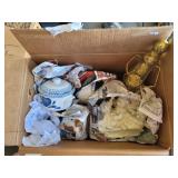 Box with old tin soldier, soup crocks and teddy