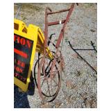 Vintage hand-powered big wheel cultivator