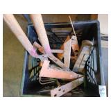 Plastic crate of tools shears splitter roof jacks