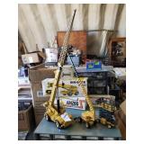 2 Grove booms and a lift and a 55 Chevy Bel Air