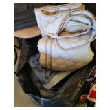 Bag of quilts and blankets