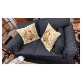 Love seat with throw pillows