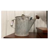 Vintage metal sprinkling can