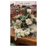 Artificial flower wreath and vase