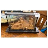 Oriental carving in display case