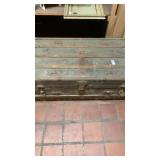 Old wooden trunk with contents inside