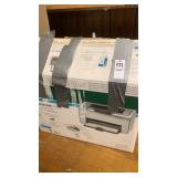 HP laser jet printer with box of computer items