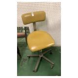 Mustard desk chair with wheels