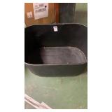 Black tin bucket