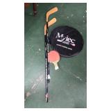 Hockey sticks, ping pong paddles and Myles hockey