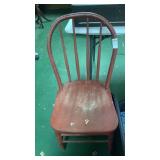 Red old wooden chair