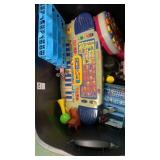 Tupperware of assorted toys