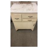 Wooden cabinet with metal top