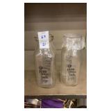Pair of Penn Cress milk bottles