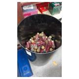 Plastic can of assorted 12 gauge shotgun shells