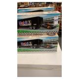 3 Mobil racing trucks in boxes