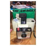 Polaroid the Swinger camera