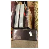 Four glass platters and one glass serving bowl