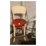 Red and white metal stool and can