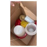 Box of bird water bowls and feeders