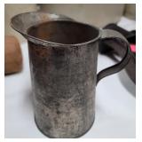 Tinware pitcher