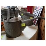 Galvanized vintage gas station radiator water can