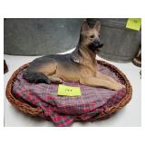 German shepherd in basket