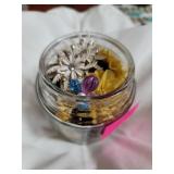 Jar of clip on ear rings