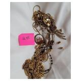 Lot of necklaces and pins