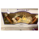 Porcelain Indian doll on hammock in 22" long box