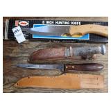 Three knives, 2 hunting knives, 1 filet knife