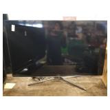 Samsung TV with a swivel metal base