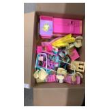 Box of Barbie doll toys and accessories