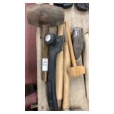 Lot of hammers, handles and scraper.