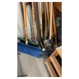 Lot of assorted shovels, rakes, saw