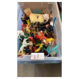 Tupperware full of plastic toys